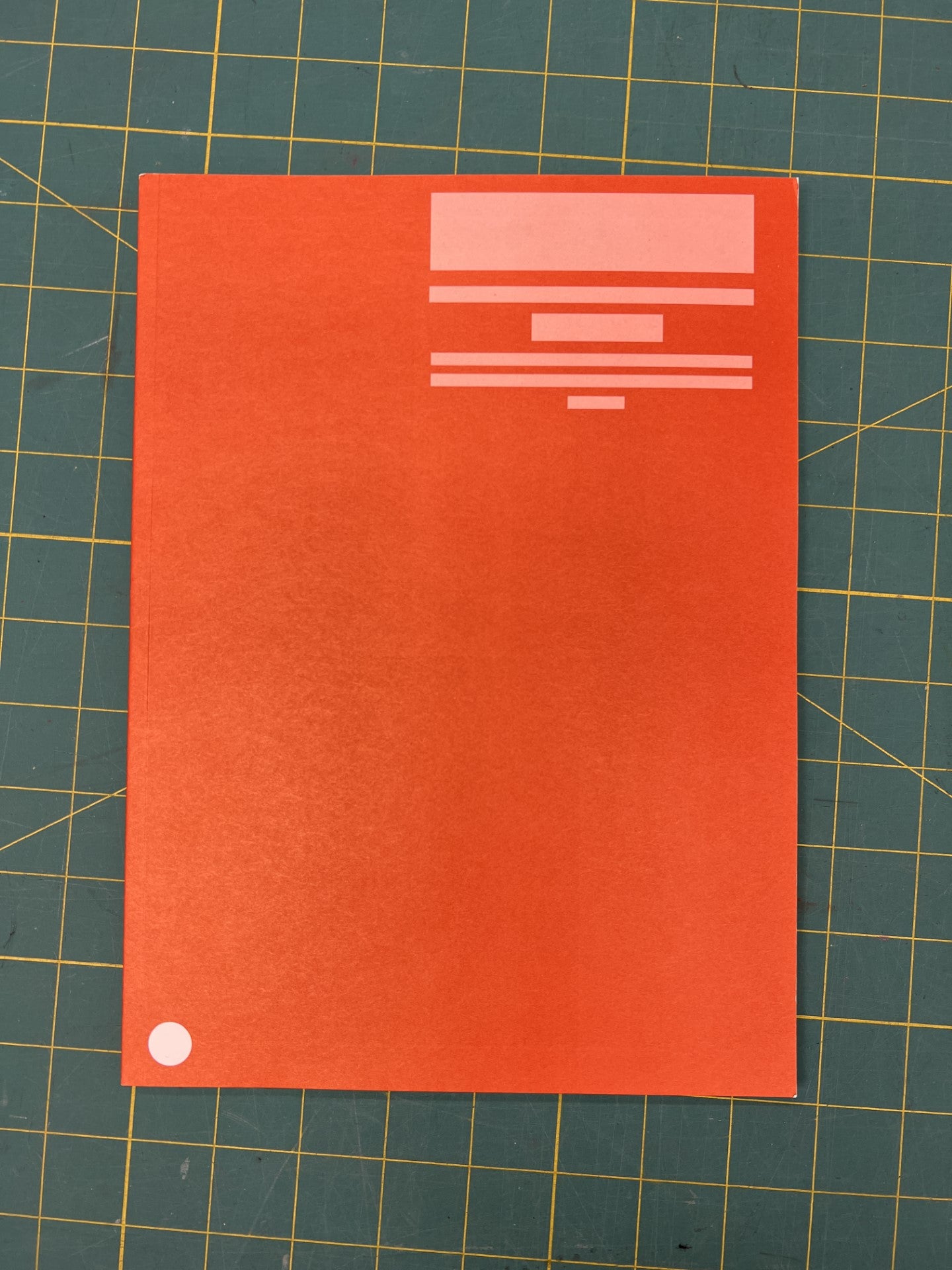 Printed Book of Stephanie Syjuco's "The International Orange Commemorative Store (A Proposition)," 2012